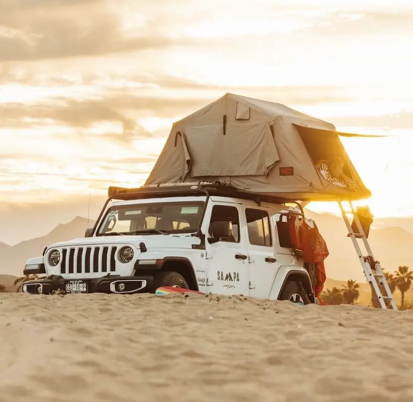 Sampa camping in Baja Sur. Jeep Wrangler with tent on the roof.