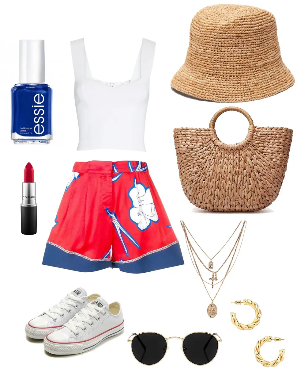 A white sleeveless blouse with red and blue floral shorts, paired with white canvas sneakers and a straw hat.