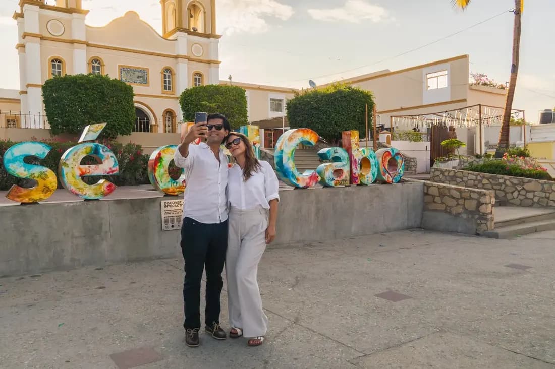 Couple taking a selfie on the City Tour by Cabo Adventures. 