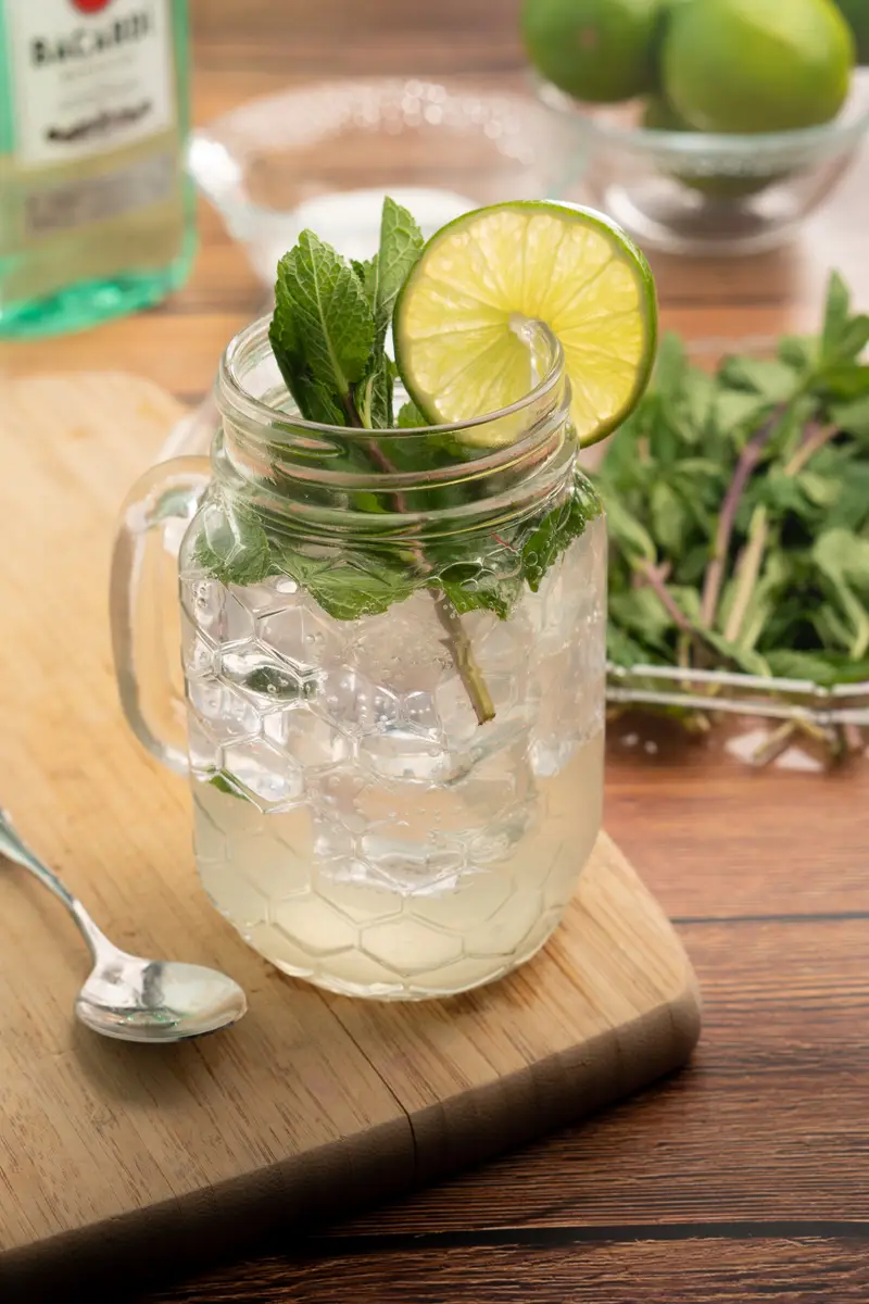 Mojito garnished with lime and mint.