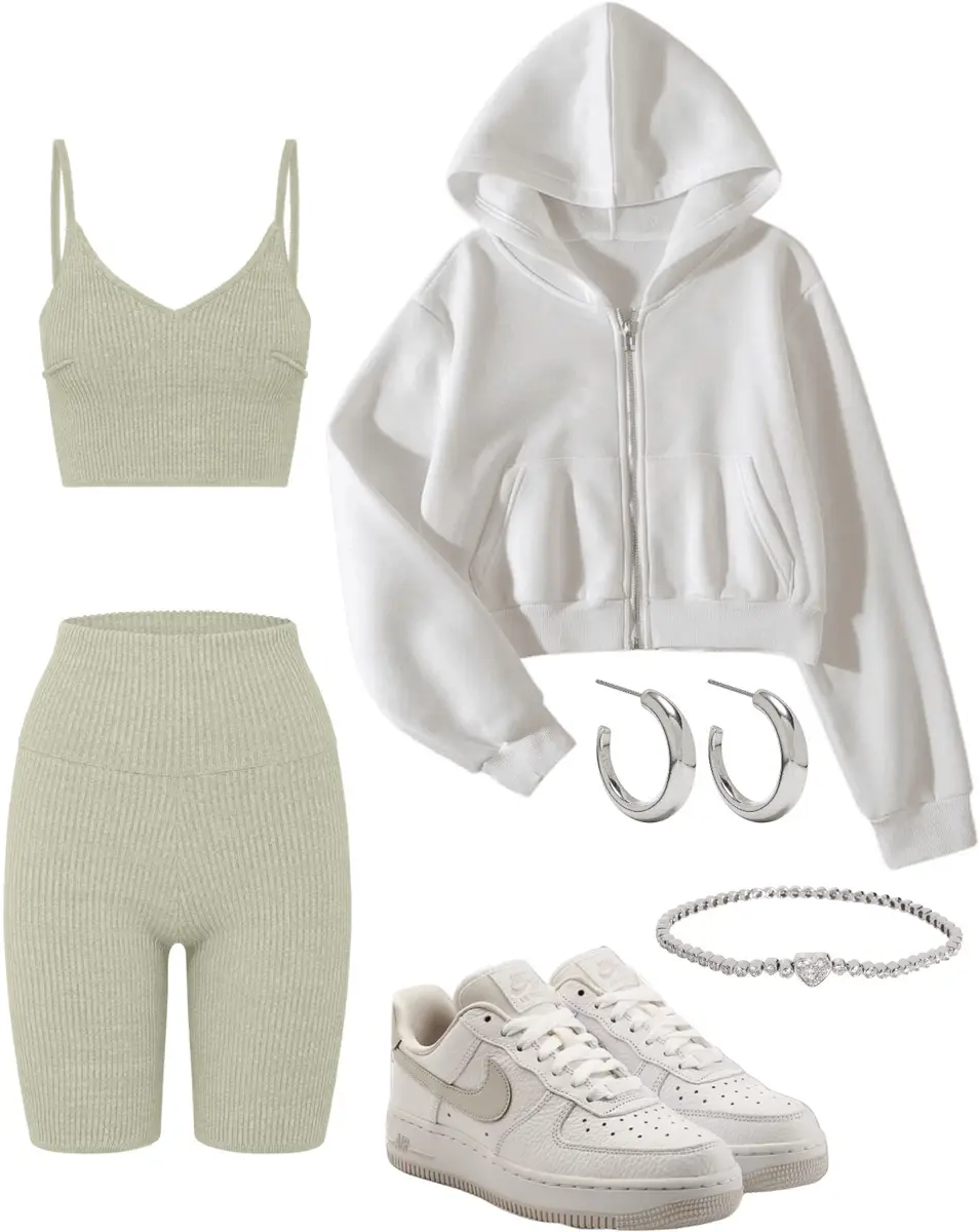 Matching light green yoga shorts and sports bra, with white sneakers, white hoodie, and silver jewelry.