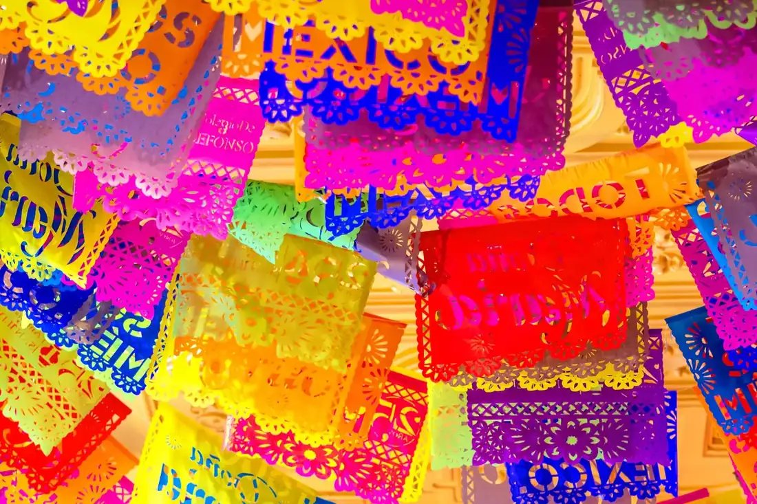 Colorful papel picado hung tightly. 