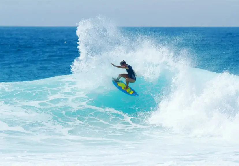 Surfer making a splash in a larger wave at Shipwrecks Beach in Baja California Sur. 