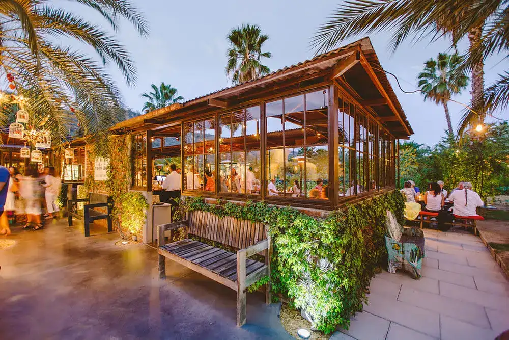 Greenhouse looking structure in Flora Farms where you can enjoy your meal.