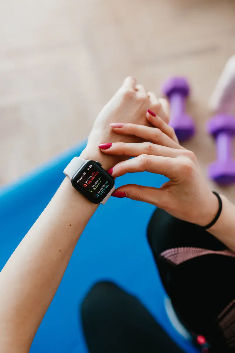 Woman checking out her fitness tracker.