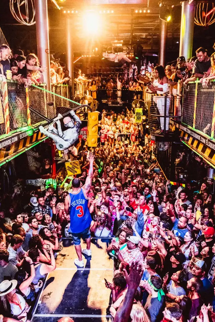 Nelly performing at a packed El Squid Roe.