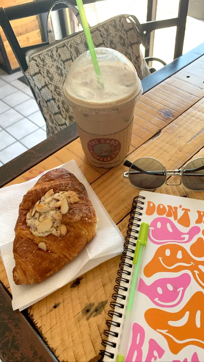 Almond croissant, paired with a chai frappe.