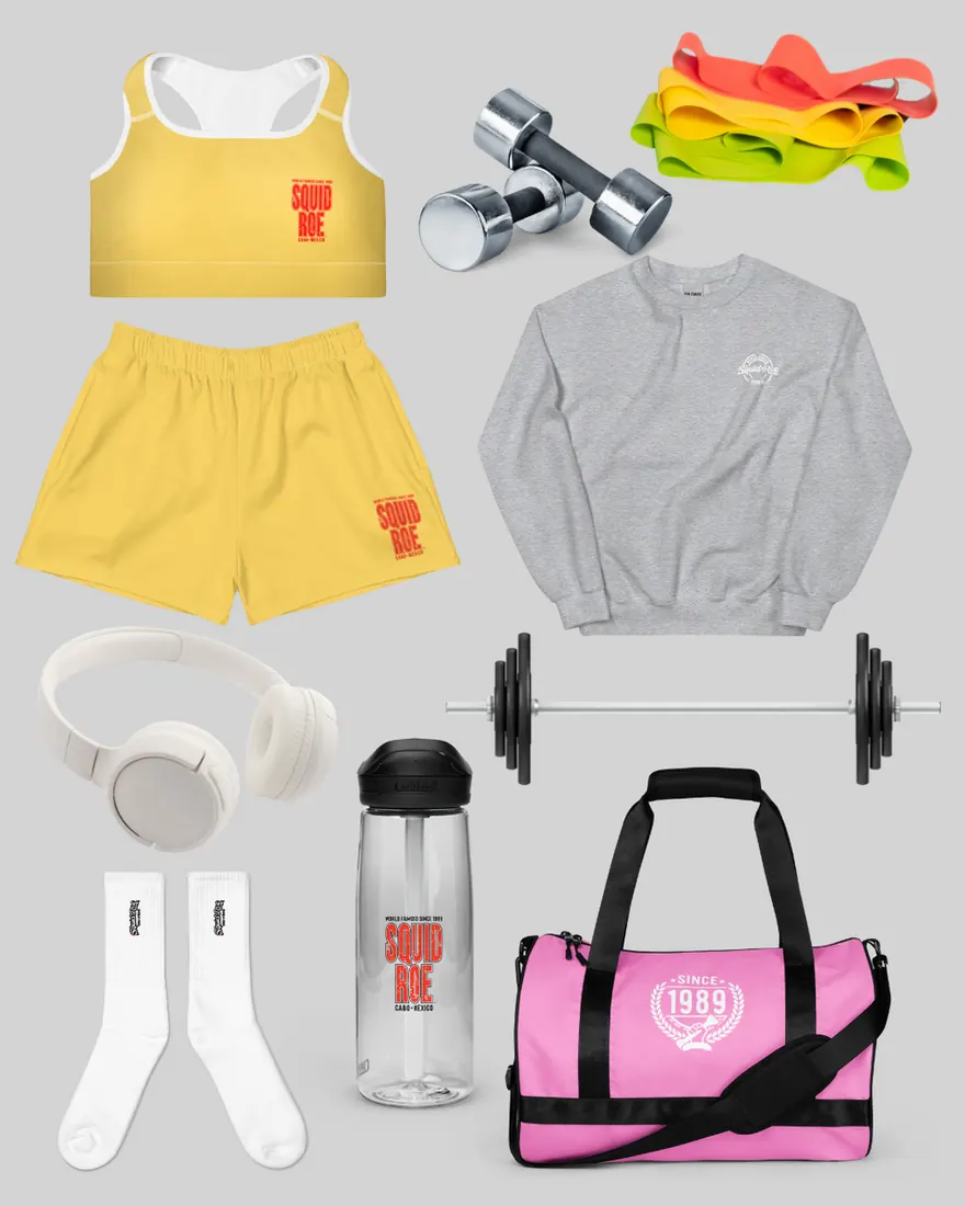 Yellow Color Pop sports bra and athletic shorts from El Squid Roe, white headphones, resistance bands, weights, grey El Squid Roe sweatshirt, barbell, reusable water bottle, El Squid Roe embroidered socks, El Squid Roe pink gym bag.