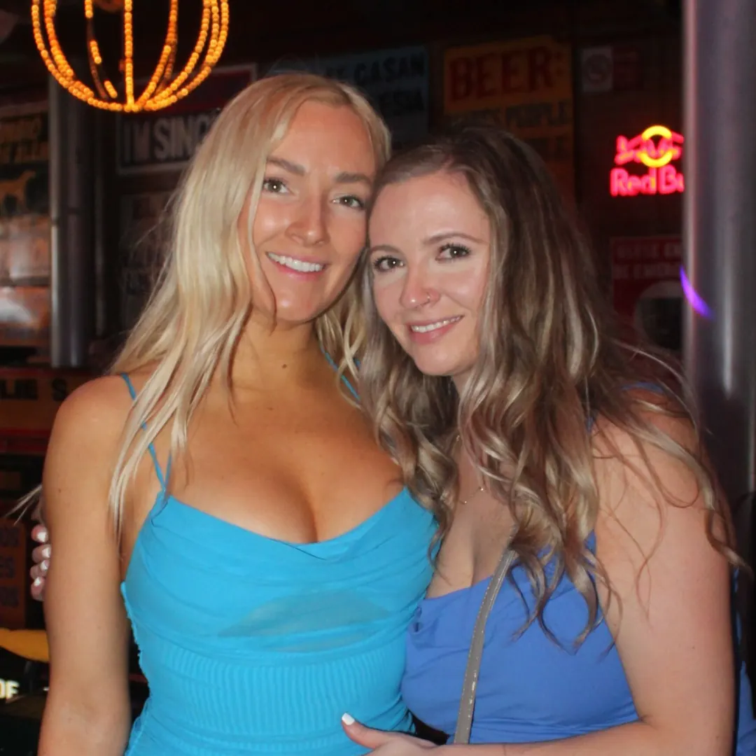 Two girls dressed in blue for the Fourth of July.
