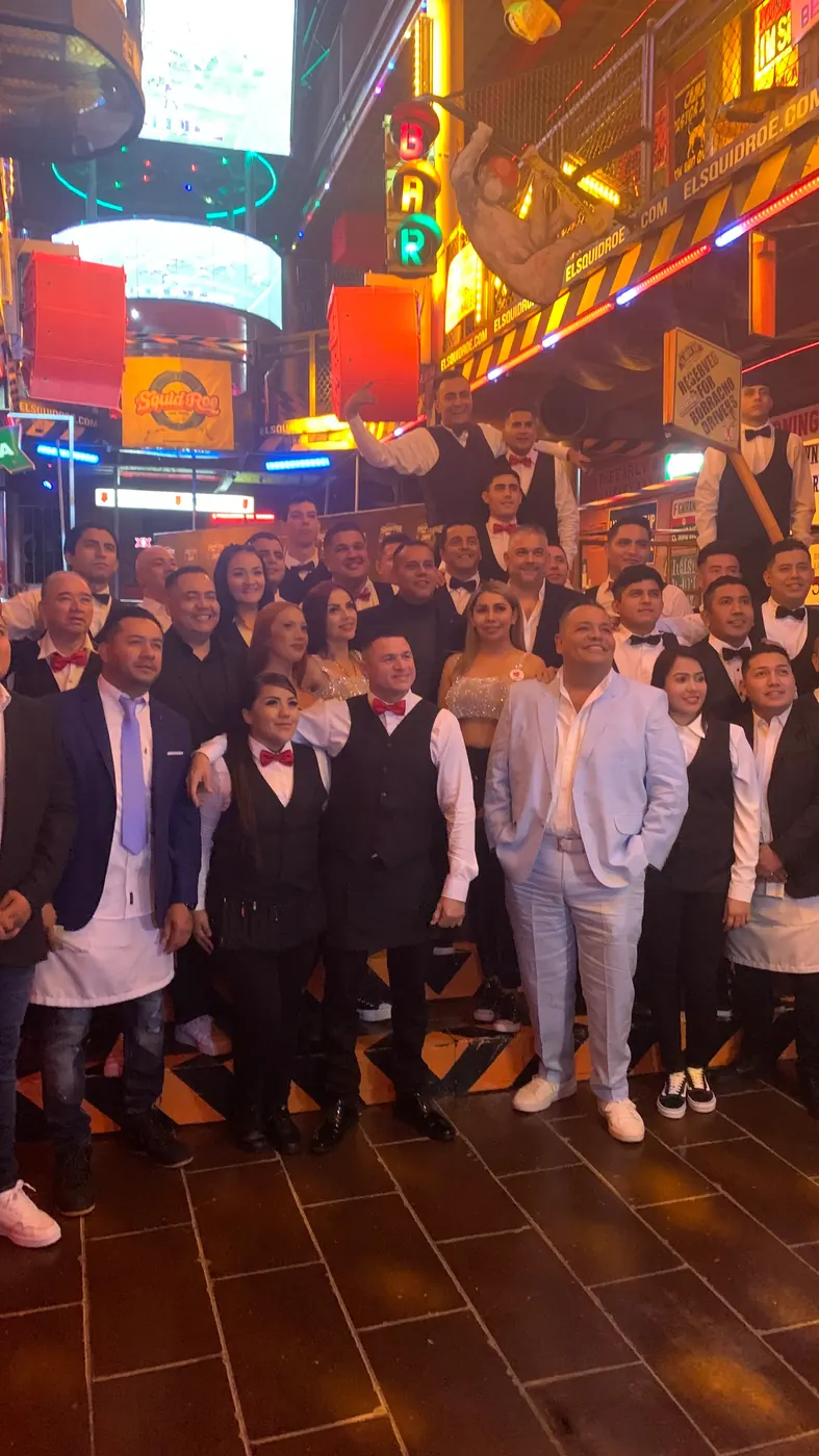 Staff of El Squid Roe dressed in their New Year's best to ring in the new year in Cabo San Lucas, Mexico.