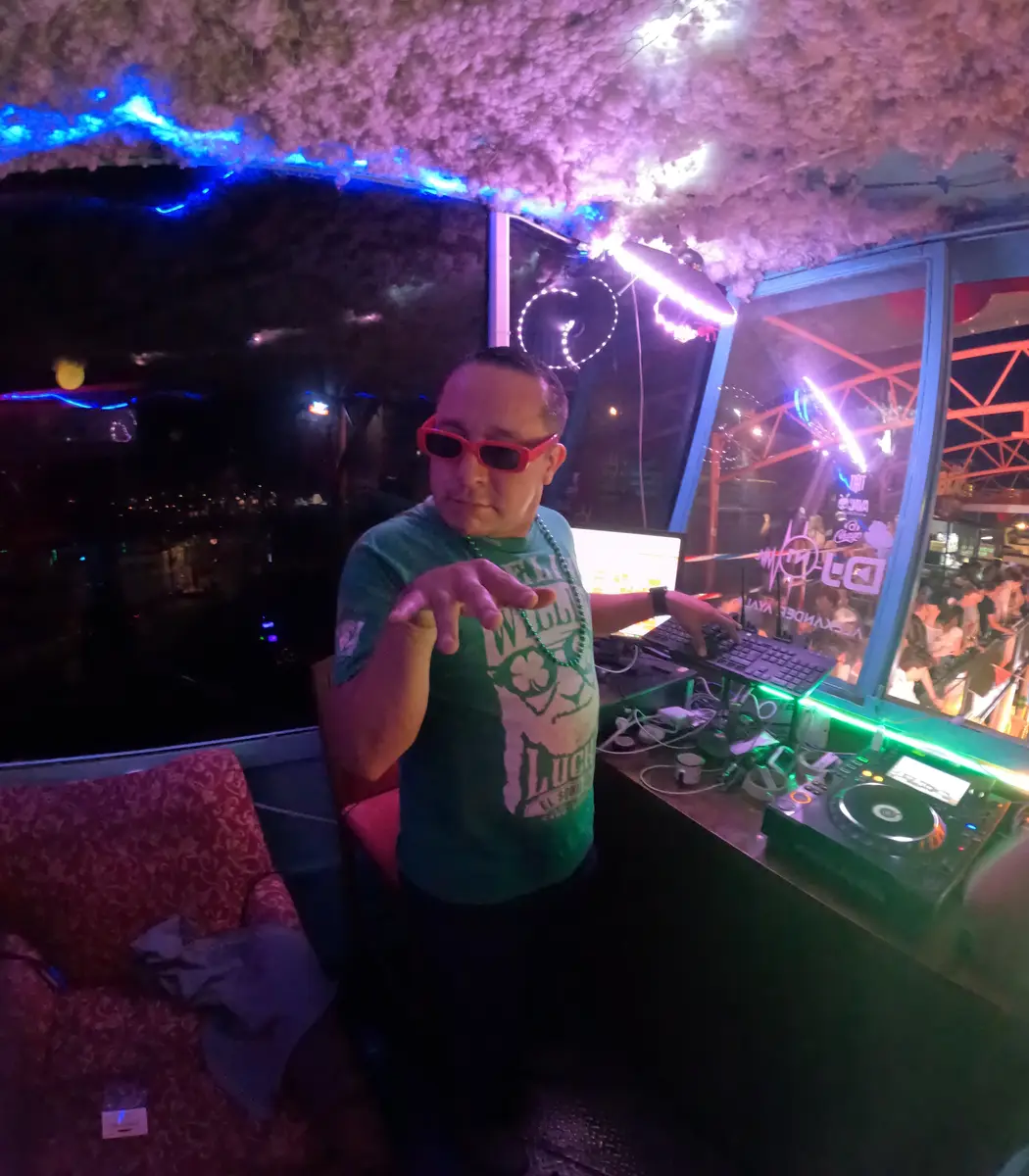 DJ Java in the DJ booth at El Squid Roe during Saint Patrick’s Day 2024 in Cabo, Mexico.