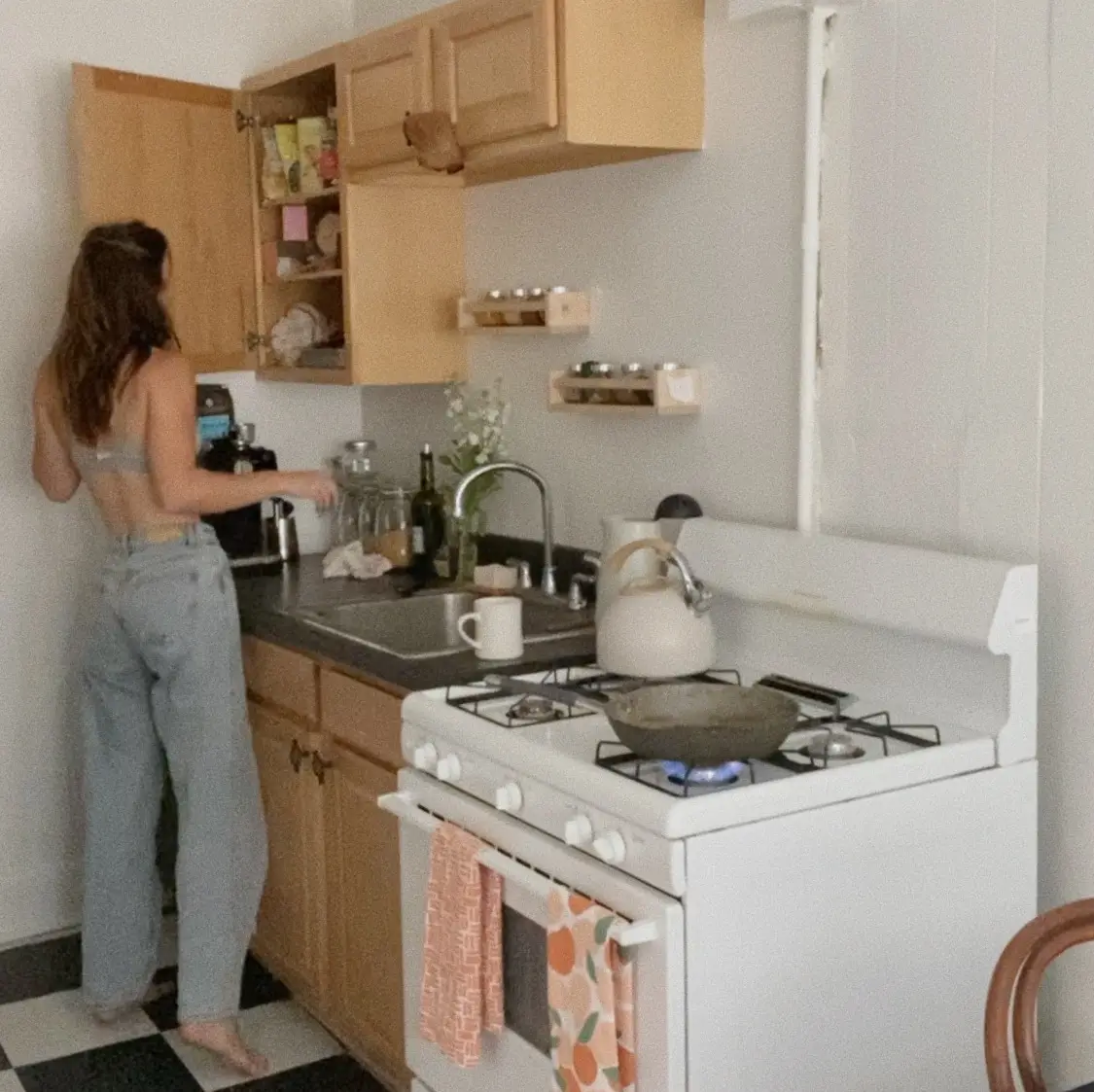 Woman cooking a meal at home.