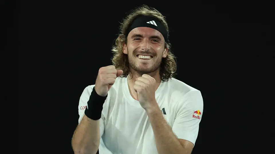 Stefanos Tsitsipas celebrating with both his hands in fist in front of him.