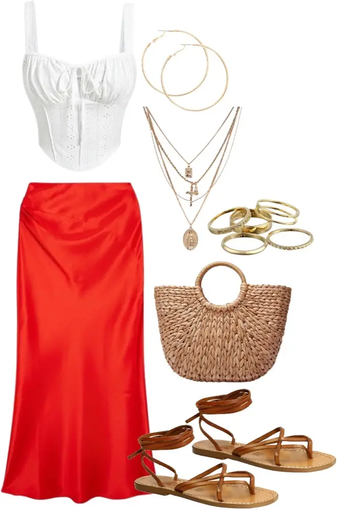 A red satin skirt, paired with a white, corset-like top, with leather sandals, woven purse, and gold rings, necklaces, and hoop earrings.