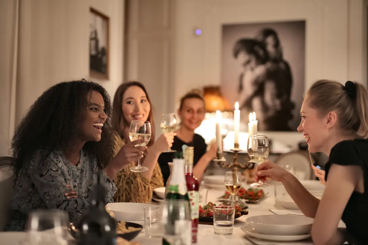 Friends connecting over dinner.
