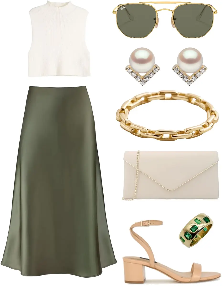 Green silk skirt paired with a white, sleeveless turtleneck, nude sandals, nude purse, and gold accessories.